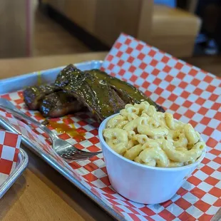 a plate of food with macaroni and cheese