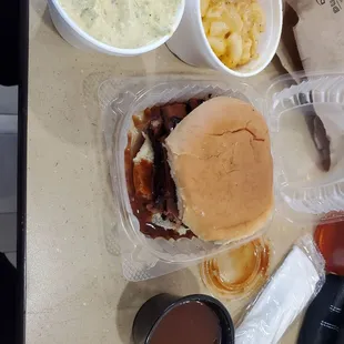 Brisket plae with potato salad, Mac and cheese, and BBQ sauce