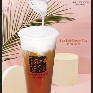 a drink being poured into a glass