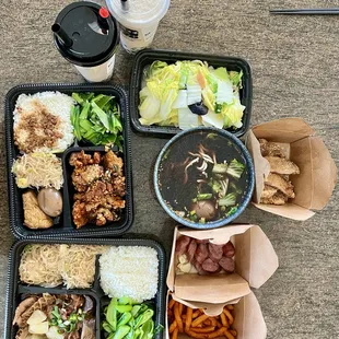 popcorn chicken rice, braised three treasures rice, napa cabbage w/ garlic, pork chop noodle, taiwanese sausage, sweet potato fries