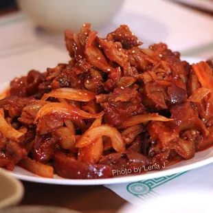 Jokbal Bokum  ($20.95) Braised Pigs&apos; Feet Pig&apos;s feet spicy stir fried. Good.