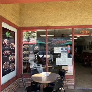 Front door with outside tables