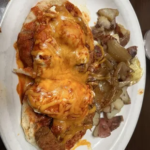 Eggs Benedict with red chile