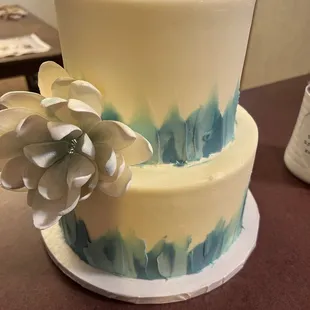 a cake with a flower on top