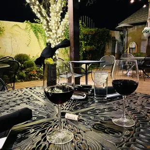 a table with wine glasses on it