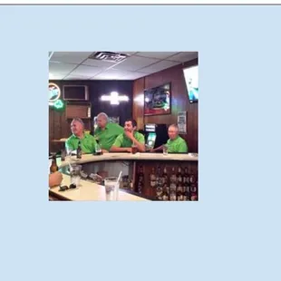 three men at the bar