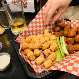 Boneless wings and tots were A++! Seriously game-changing! But what's the hand doing trying to steal my toys oh no!