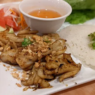 a plate of food with rice and vegetables