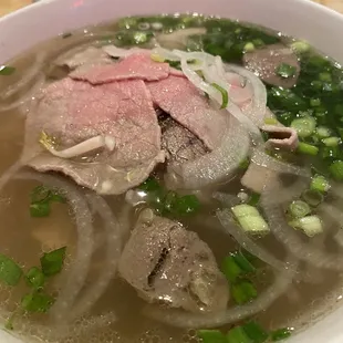 22. Vietnamese Deluxe Noodle Soup Sliced flank steak, beef brisket, and beef balls w/ rice noodle soup.