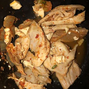 Some of the tender chicken pieces in the stew