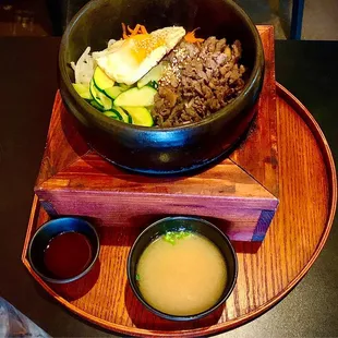 Dolsot BiBimBap w/ beef, zucchini, carrots, bean sprouts, sunny side-up eggs and rice in a hot claypot for socarrat type of crust $15   3.5*