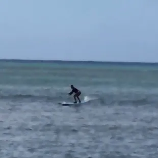 Surfing!   **If you really want photos pay the $50 for Hans School to capture you. We just used an iPhone from on the shore / jetty.)**