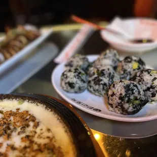 a variety of sushi on plates