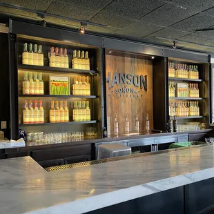 Second level bar inside the Hanson of Sonoma Tasting Room at Hanson Gallery in Sausalito.