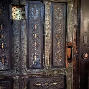an old door with ornate carvings