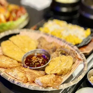 Fried beef, potato, fish