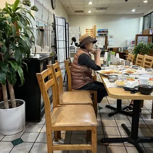 a woman sitting at a table