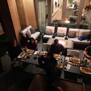 a group of people eating outside