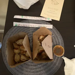 1/2 order chicken and 1/2 order pork dumplings. Pan fried with chili sauce