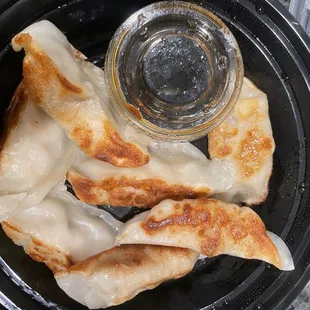 A8. Pan-Fried Potstickers (8)