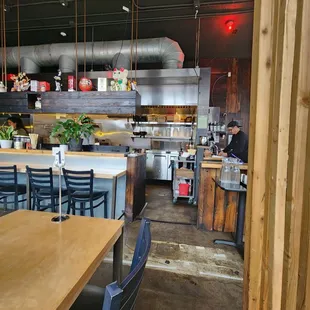 a view of the kitchen from the dining room