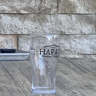 a pint glass on a table