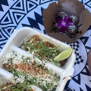 Huli Huli chicken taco + bugolgi taco and comes with hapa corn. Plus the ube Mochi bites sooo good!