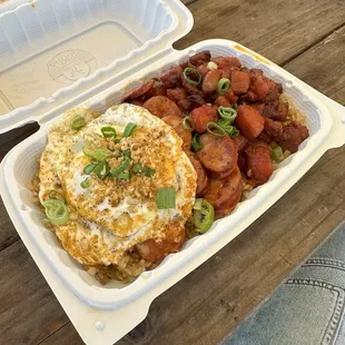 Silog bowl with chicken on the right (good) and Portuguese sausage in the middle (bland). Next time I'd get the chicken and steak! Yum!