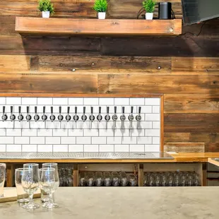 Get a fresh beer from Hapa's, a glass of wine, or hard Kombucha.