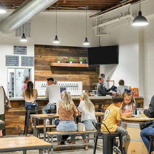 a group of people sitting at tables