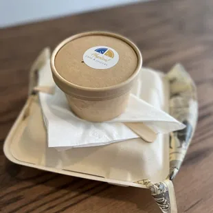 a cup of coffee on a napkin