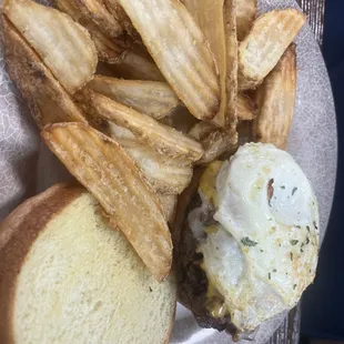 a hamburger and fries on a plate
