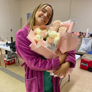 Actress Bailee Madison loving her bouquet.