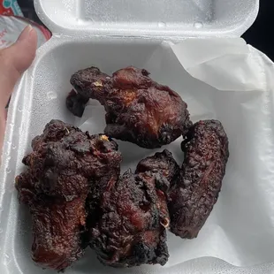 Disgusting!!!! Burnt chicken wings. Do not come here. How can you pack this for a customer????