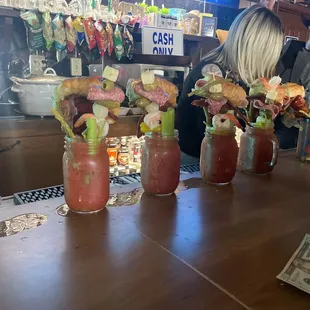 a row of bloody bloodys with a man in the background
