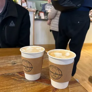 two cups of coffee on a table