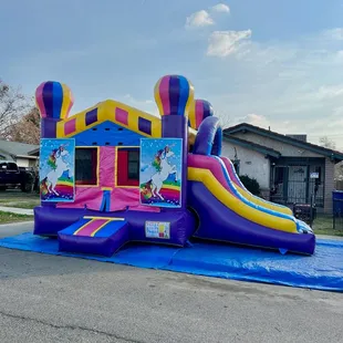 Unicorn bounce house with dry slide