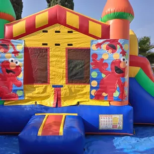 Bounce house with dry slide Elmo