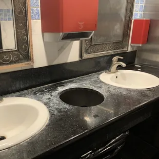 Mirrors completely covered in film, this white powdery stuff was all over the bathroom as well.