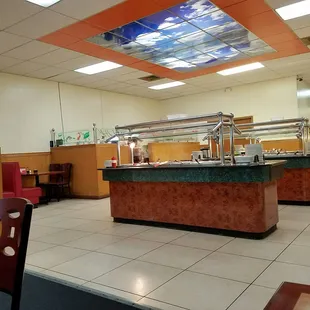 a view of the buffet area of a restaurant