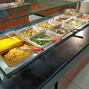 a variety of food items in a buffet