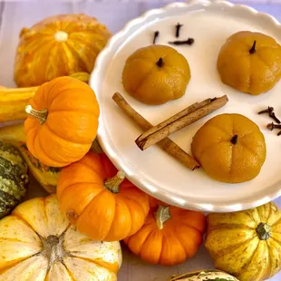 Gluten free Pumpkin Mochi that is chewy with a black sesame filling