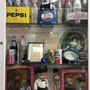 a display of pepsi memorabilia