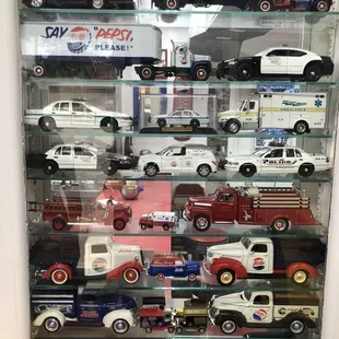 a display case full of toy trucks