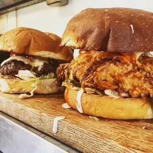 two sandwiches on a cutting board