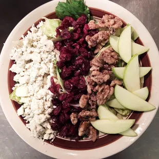 Summer salad-candied walnuts, blue cheese crumbs, granny smith apples, and cranberries