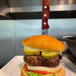 Never frozen Patty's. Cheese Burger