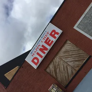 a sign on the side of a building