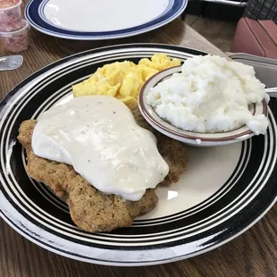 chicken fried steak with gravy and mashed potatoes