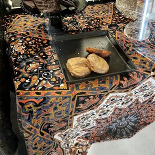 a tray of pastries on a table